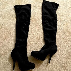 Thigh high heel boots